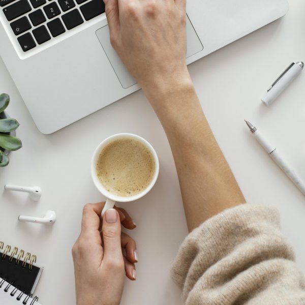 woman-taking-notes-her-laptop